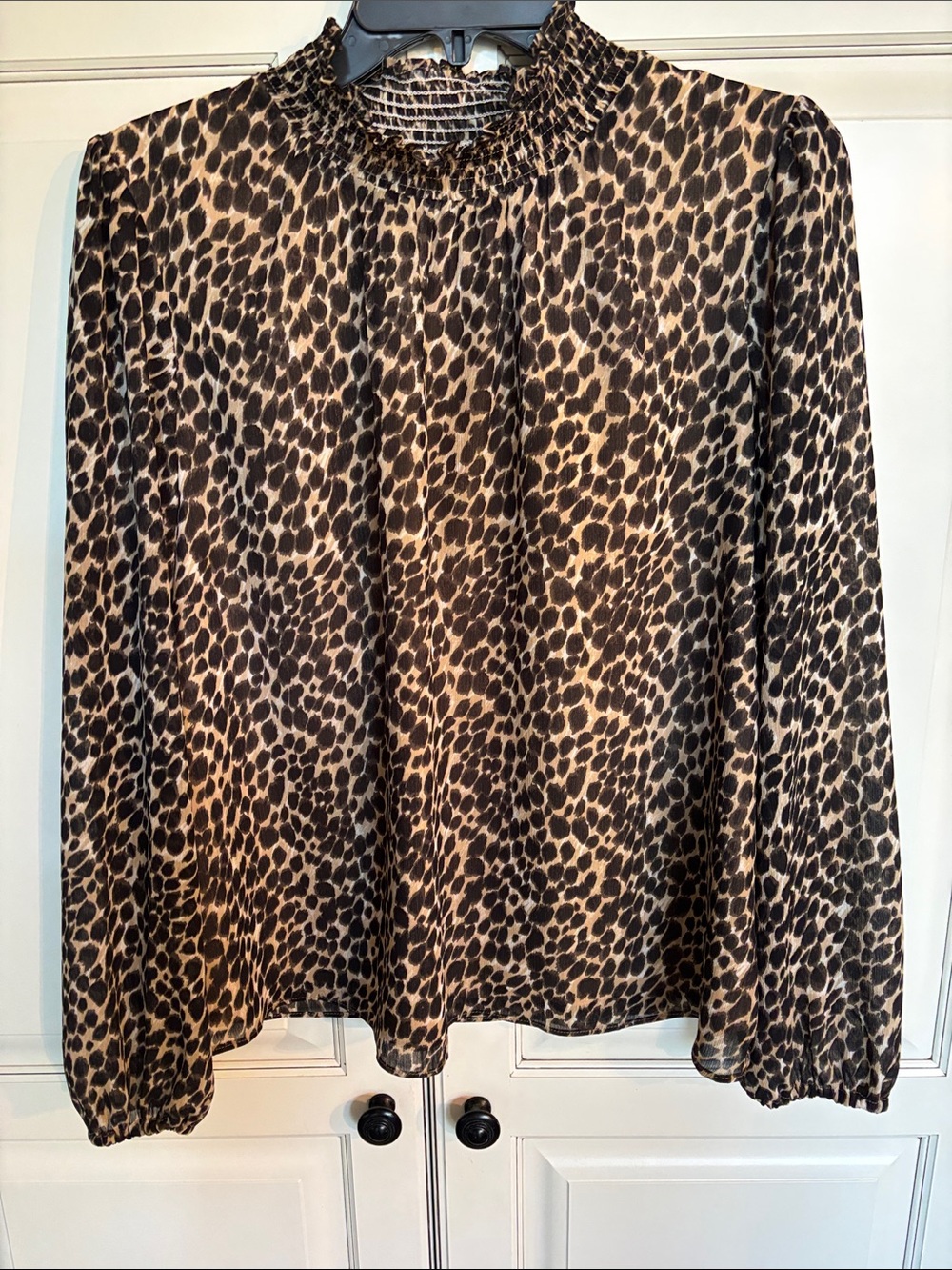 J Crew trendy animal print blouse with sheer sleeves and smocking at neckline